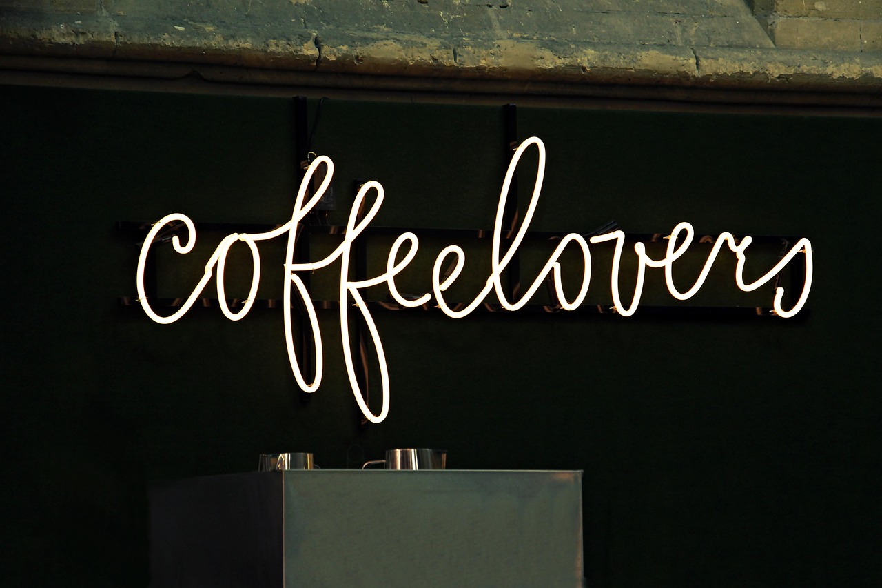 Neon sign, coffee lovers, coffee — Exploring the World on Electric Bikes